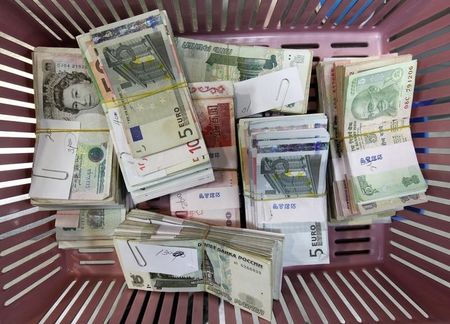 Brazilian real drops on report linking Bolsonaro to bank scandal